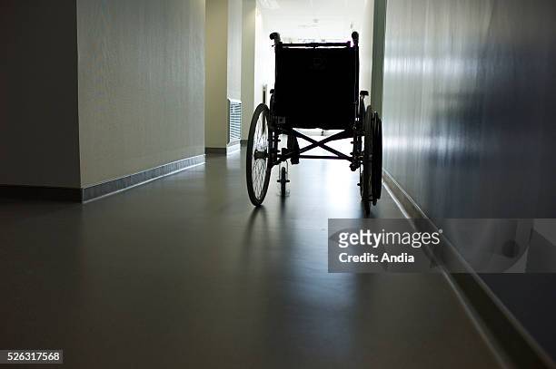 Wheelchair in a corridor of the Department of Neurology and Functional Exploration of the hospital "hopital de Hautepierre" in Strasbourg .