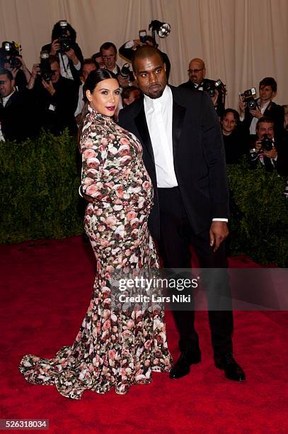 Kanye West and Kim Kardashian attend the Costume Institute Gala for the 'PUNK: Chaos to Couture' exhibition at the Metropolitan Museum of Art in New...