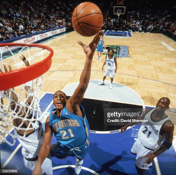 Jamaal Magloire of the New Orleans Hornets lays up a shot during the NBA game against the Minnesota Timberwolves at Target Center on March 23, 2005...