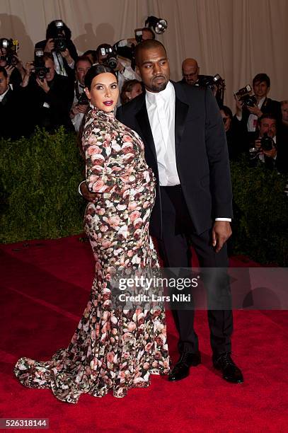 Kanye West and Kim Kardashian attend the Costume Institute Gala for the 'PUNK: Chaos to Couture' exhibition at the Metropolitan Museum of Art in New...