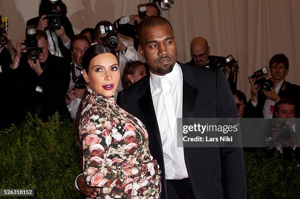 Kanye West and Kim Kardashian attend the Costume Institute Gala for the 'PUNK: Chaos to Couture' exhibition at the Metropolitan Museum of Art in New...