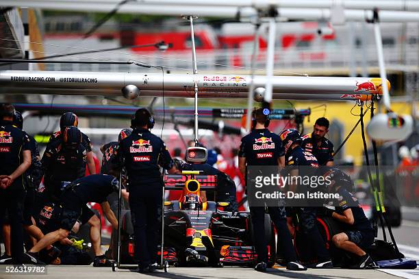 Daniil Kvyat of Russia driving the Red Bull Racing Red Bull-TAG Heuer RB12 TAG Heuer comes back into the pits during final practice ahead of the...