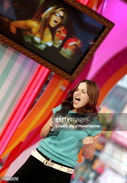 Karaoke contestant Talya sings during an appearance on MTV's Total Request Live on April 14, 2005 in New York City.