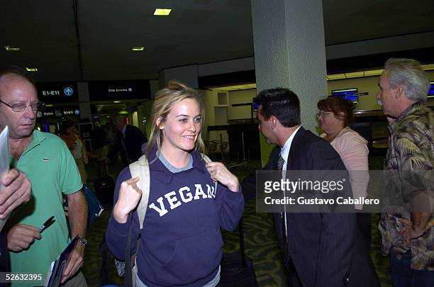 Actress Alicia Silverstone arrives at Miami International Airport on April 14, 2005 in Miami, Florida.