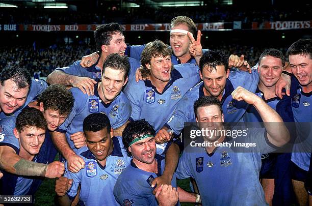 The NSW Blues celebrate after winning game three and the series 2-1 after the ARL State of Origin match between the Queensland Maroons and the New...