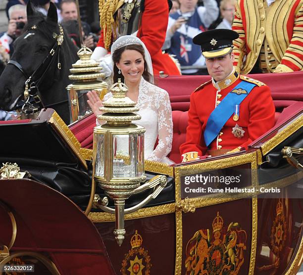 Prince William and Princess Catherine in the procession after their Royal wedding at Westminster Abbey .