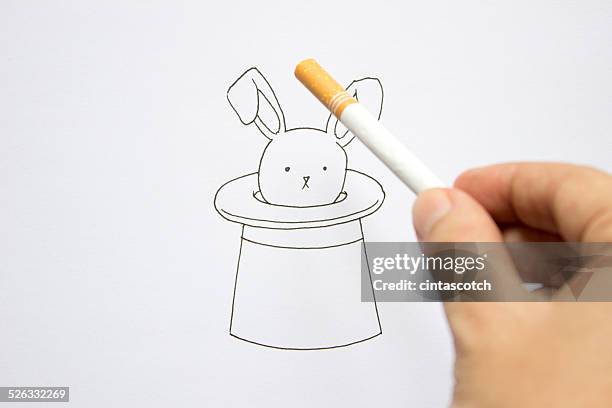 conceptual rabbit in a magician's hat - magic wand hand stock pictures, royalty-free photos & images