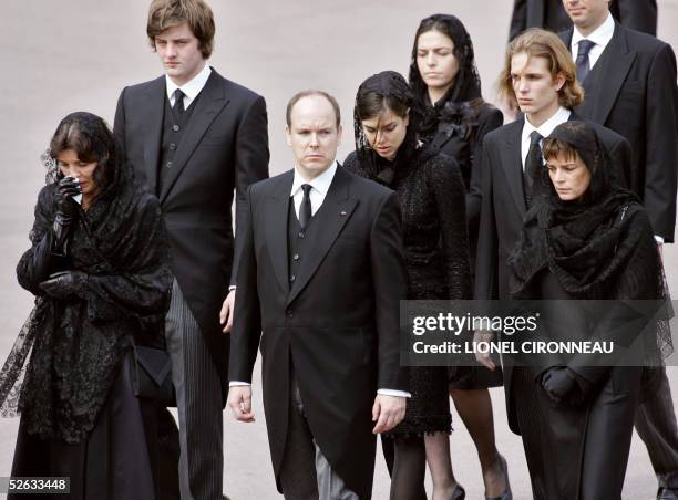 Late Prince Rainier III follows the coffin carrying the body of the prince outside the Prince Palace, 15 April 2005 in Monaco before the funeral at...