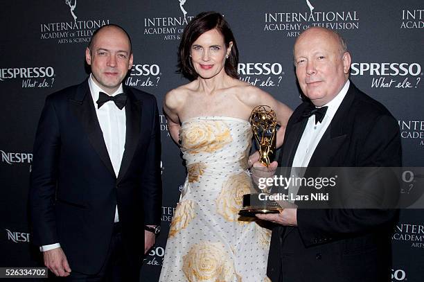 Gareth Neame, Elizabeth McGovern and Julian Fellowes attend the "43rd International Emmy Awards" at the New York Hilton in New York City. �� LAN