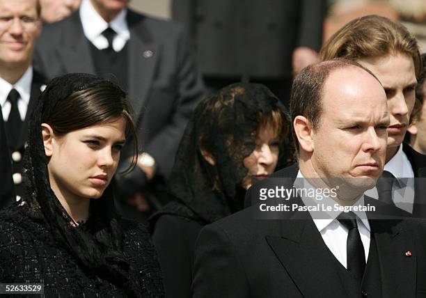 Prince Albert and Princess Charlotte attend the funeral of Monaco's Prince Rainier III at Monaco Cathedral on April 15, 2005 in Monte Carlo, Monaco....