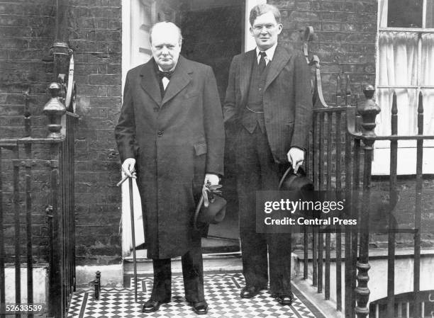 British statesman Winston Churchill leaving for the House of Commons with Irish journalist and Minister for Information Brendan Bracken , 12th April...