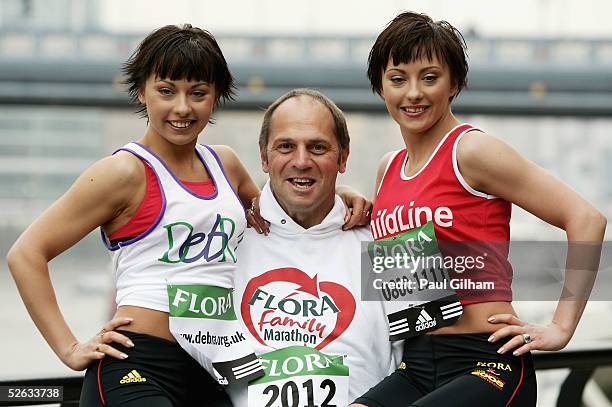 The Cheeky Girls are lifted up by Sir Steve Redgrave during the Press Conference and Photo Call for the London Marathon 2005 at the Thistle Hotel on...