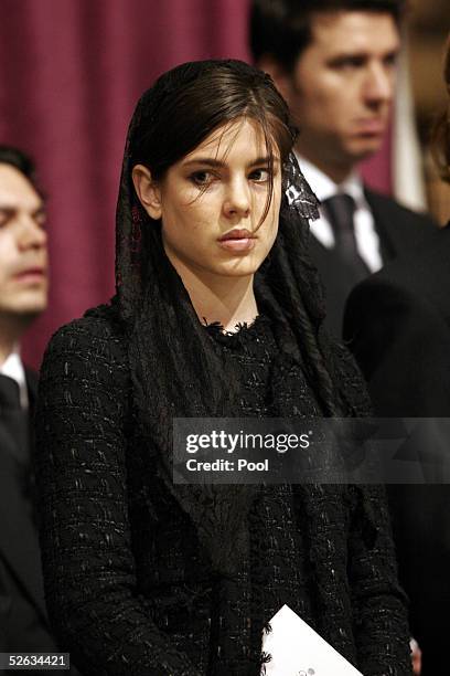 Charlotte Casiraghi is seen inside the Cathedral at the funeral service of Monaco's Prince Rainier III at Monaco Cathedral on April 15, 2005 in Monte...