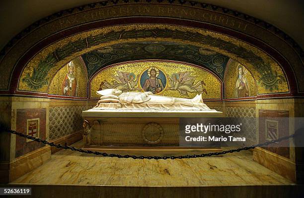 Papal crypt is seen in the grotto beneath Saint Peter's Basilica where Pope John Paul II has been buried April 15, 2005 in Vatican City. A total of...