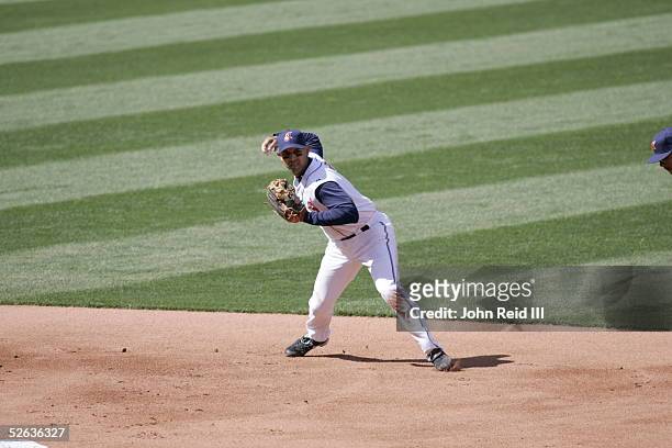 Alex Cora of the Cleveland Indians fields during the game against the Chicago White Sox at Jacobs Field on April 11, 2005 in Cleveland, Ohio. The...