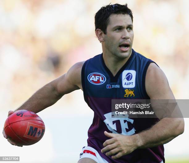 Chris Johnson for Brisbane in action during the round four AFL match between the Hawthorn Hawks and the Brisbane Lions at the MCG on April 16, 2005...