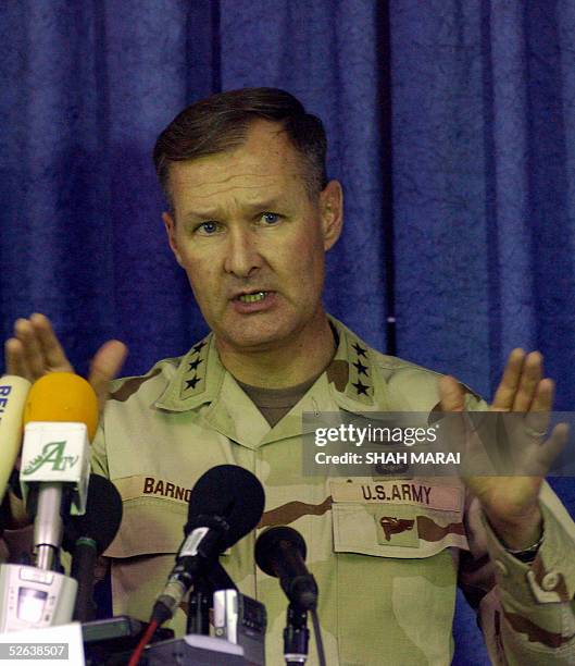 Commander of the US forces in Afghanistan, Lieutenant General David Barno gestures during a press conference in Kabul,16 April 2005. The Taliban and...