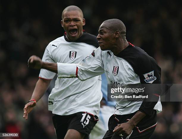 Luis Boa Morte of Fulham celebrates his goal with Collins John during the Barclays Premiership League match between Fulham and Manchester City at...