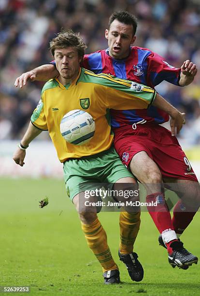 Thomas Helveg of Norwich is tackled by Dougie Freedman of Palace during the Barclays Premiership match between Crystal Palace and Norwich City at...