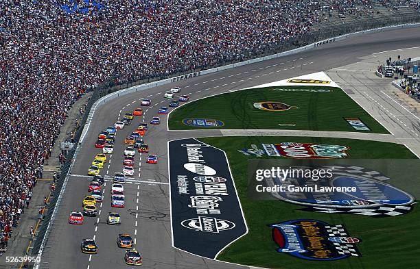 Shane Hmiel driver of the WINFUEL Chevrolet and Martin Truex Jr. Driver of the Bass Pro Shops/TRACKER Chevrolet lead the field at the start of the...