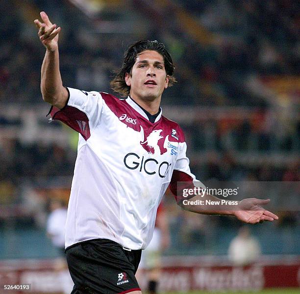 Marco Borriello of Reggina celebrates a goal during the Serie A match between AS Roma and Reggina at the Stadio Olimpico on April 16, 2005 in Rome,...