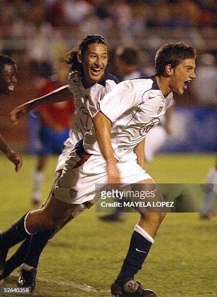 Jeremy Hall celebrates scoring the first goal against Costa Rica, with his teammate Omar Gonzalez during their Concacaf final quadrangular for a...