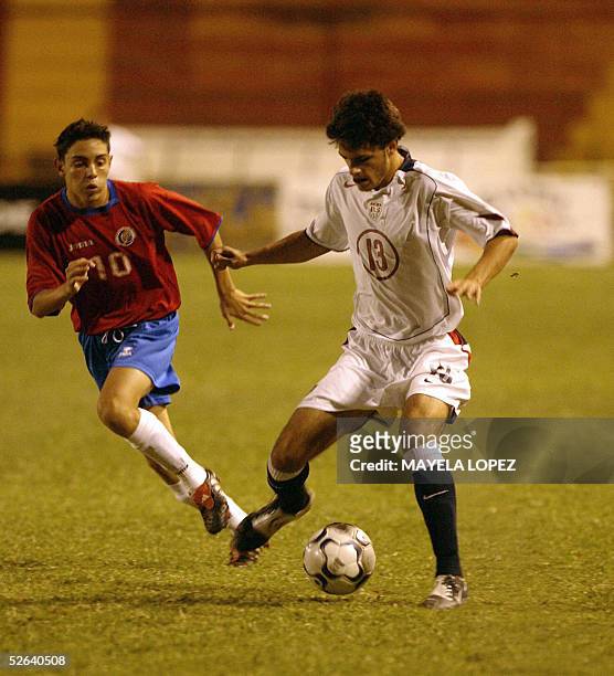 Costarican Luis Diego Cordero and Blake Wagner of the US vie for the ball during the Concacaf final quadrangular for a place in the Under-17 Peru...