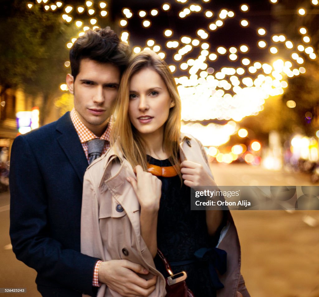 Couple with Christmas lights