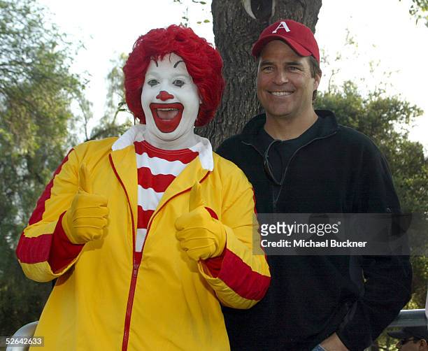 Ronald McDonald and actor Ted McGinley arrive at the starting line of the 24th annual Saint John's Jimmy Stewart Relay Marathon at Griffith Park on...