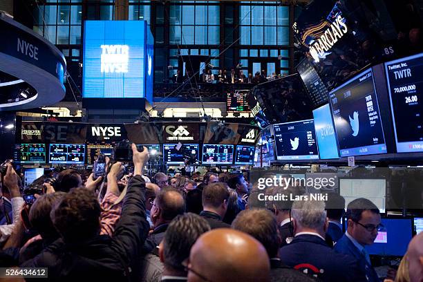 Traders monitor Twitter Inc.'s initial public offering on the floor of the New York Stock Exchange in New York City. Twitter Inc. Sold 70 million...