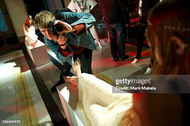 Models are photographed while exhibiting the Maria Francesca Pepe autumn 2011 collection during a presentation at Freemason's Hall in London on 22...