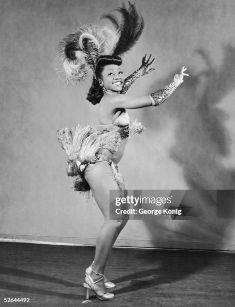American showgirl Baby Scruggs as she appears in the revue 'From Paris To Piccadilly', at the Prince of Wales Theatre, London, 25th April 1952.