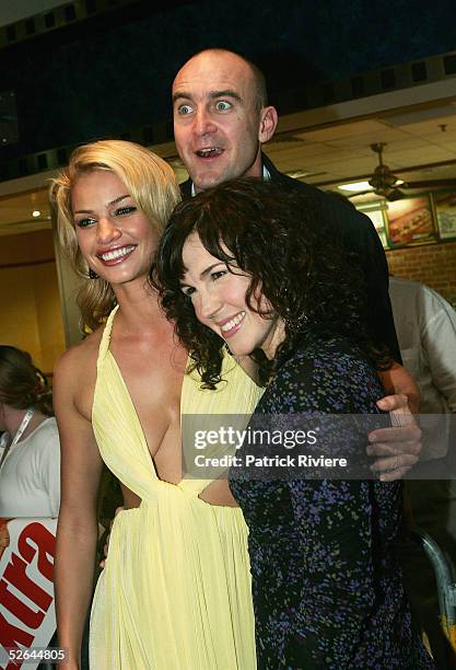Model\actress Kristy Hinze , actor\director Jimeoin McKeown and Katherine Slattery pose on the red carpet at the premiere of "The Extra" at Hoyts...