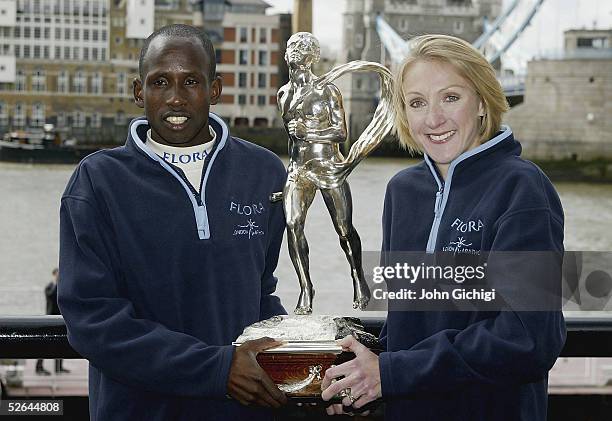 Paula Radcliffe of Great Britain and Martin Lel of Kenya, winners of the London Marathon 2005, pose with the Chris Brasher Sporting Life trophy...