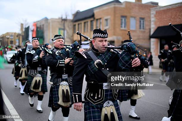 Chicago Police Department Bagpipe band marches during a St Patricks Day paraden in Chicago, IL on Sunday, March 17, 2013. There was Green beer, Irish...