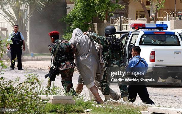 Iraqi Special Forces arrest a suspect April 18, 2005 in the Iraqi town of Madain, 18 miles south of Baghdad, Iraq. Iraqi forces backed by US troops...