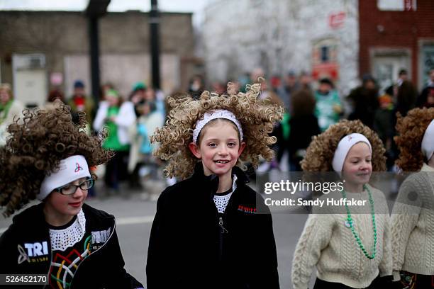 Young Irish American folk dancers perform during a St Patricks Day paraden in Chicago, IL on Sunday, March 17, 2013. There was Green beer, Irish folk...