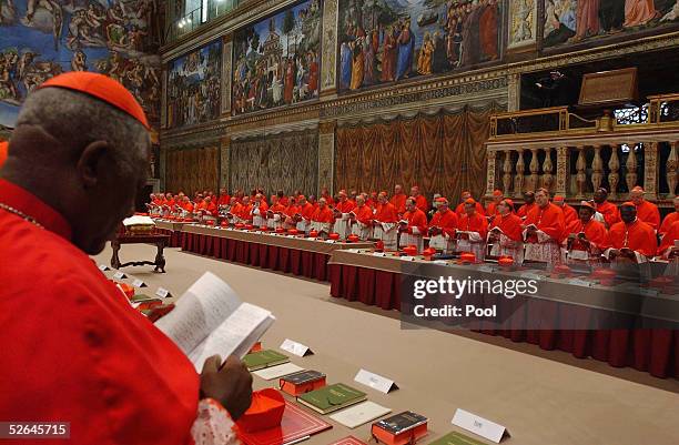 Cardinals of the Catholic Church attend the election conclave in the Sistine Chapel on April 18, 2005 at the Vatican, Vatican City. The 115 Cardinals...