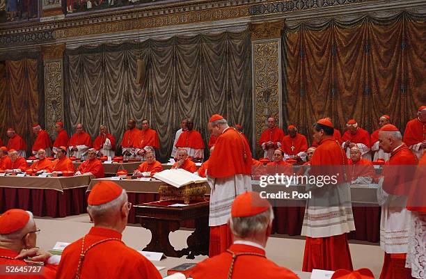 Cardinals of the Catholic Church attend the election conclave in the Sistine Chapel on April 18, 2005 at the Vatican, Vatican City. The 115 Cardinals...