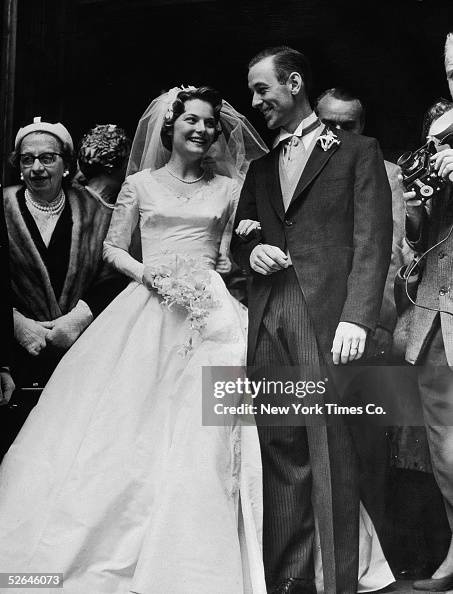 American figure skaters Carol Heiss and Hayes Alan Jenkins pose for