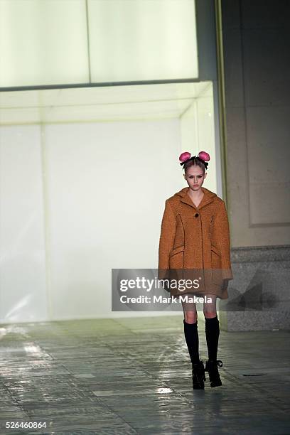 Models exhibit the Unique autumn 2011 collection at the TS Venue in London on 20 February 2011.