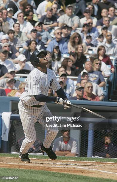 Infielder Tony Womack of the New York Yankees swings at a Boston Red Sox pitch during the game at Yankee Stadium on April 5, 2005 in Bronx, New York....