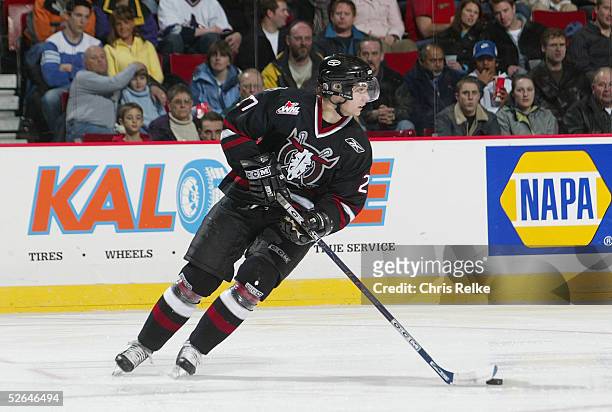 Jesse Zetariuk of the Red Deer Rebels skates with the puck against the Vancouver Giants at Pacific Coliseum on February 16, 2005 in Vancouver,...