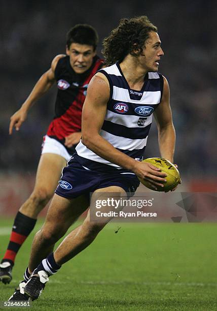 Kane Tenace of the Cats in action during the round four AFL match between the Geelong Cats and the Essendon Bombers at the Telstra Dome April 16 2005...