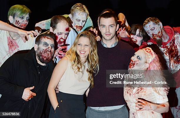 Nicholas Hoult and Teresa Palmer attend a photo call to promote Warm Bodies at the Soho Hotel.