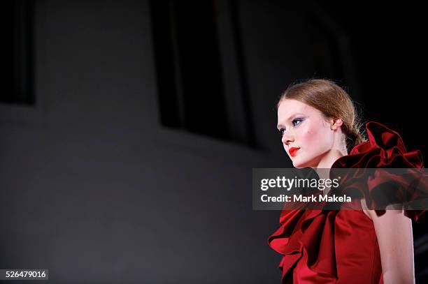 Models exhibit the Temperley autumn 2011 collection at The British Museum in London on 20 February 2011. This runway show marked the designer's 10...