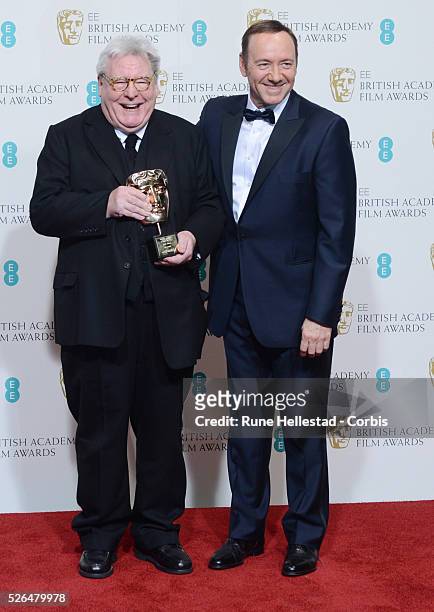 Alan Parker and Kevin Spacey attend the EE British Academy Film Awards at the Royal Opera House.
