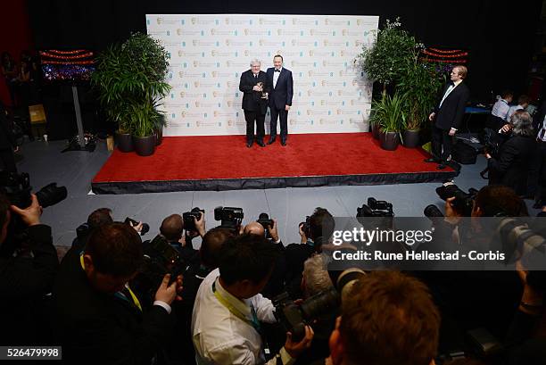 Alan Parker and Kevin Spacey attend the EE British Academy Film Awards at the Royal Opera House.