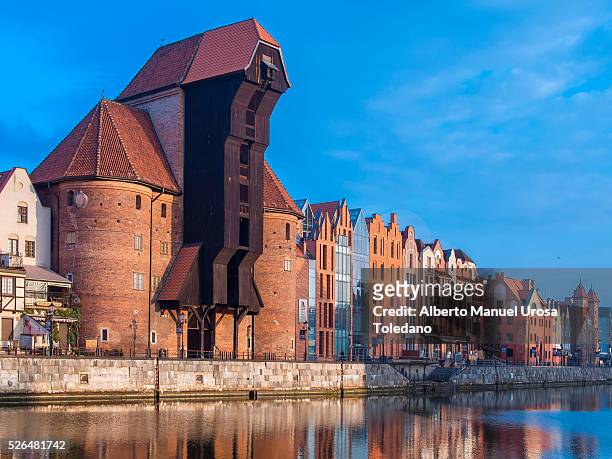 poland, gdansk, motlawa river and zuraw crane sunset - gdansk stock pictures, royalty-free photos & images