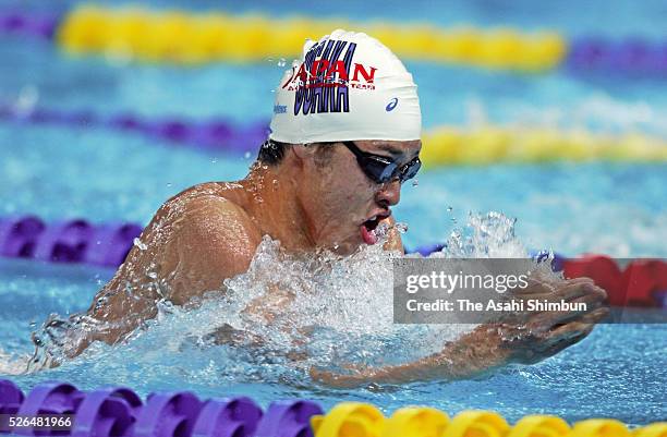 Kosuke Kitajima of Japan competes in the Men's 100m Breaststroke during the East Asian Games at the Osaka Pool on May 21, 2001 in Osaka, Japan.